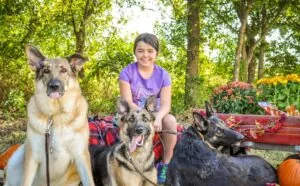 Girl With German Shepherds