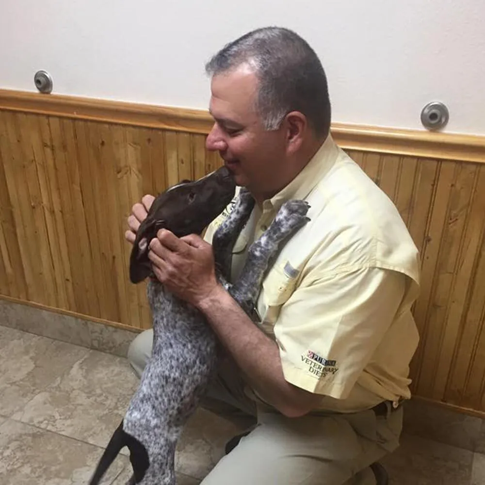 Doctor With German Short Haired Pointer Puppy